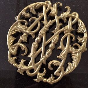 Vintage brass trivet by Virginia Metal Crafters